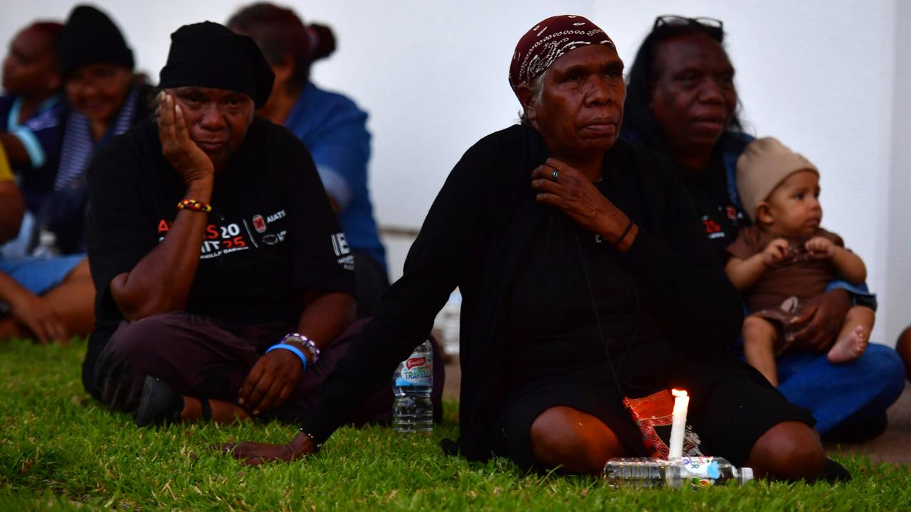 Warlpiri community leaders stood outside the NT Parliament on Wednesday during a vigil for Kumanjayi White, a 24-year-old Yuendumu man with a disability who died after being restrained by police in the Alice Springs Coles. Picture: Zizi Averill