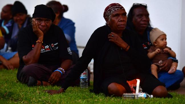 Warlpiri community leaders stood outside the NT Parliament on Wednesday during a vigil for Kumanjayi White, a 24-year-old Yuendumu man with a disability who died after being restrained by police in the Alice Springs Coles. Picture: Zizi Averill