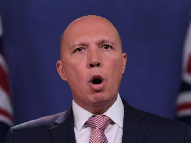 Federal Minister for Home Affairs Peter Dutton speaks to the media during a press conference at the Commonwealth Parliamentary offices in Sydney, Tuesday, November 20, 2018. (AAP Image/Dean Lewins) NO ARCHIVING