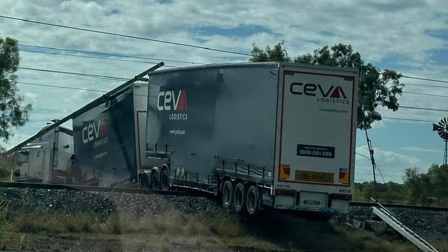 An accident between a truck and vehicle which closed the Bruce Highway at 2.54am at Raglan, 55km south-east of Rockhampton, in the vicinity of Fitzroy Street also took down power lines and prevented any trains crossing rail tracks while the truck was across the rail line. Photo: Contributed