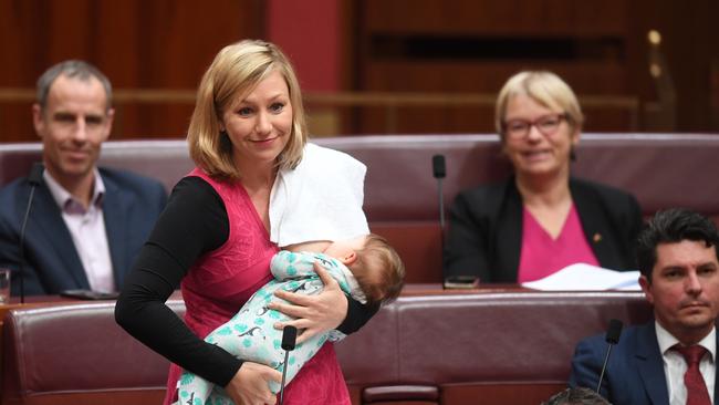 Larissa Waters put forward a motion on Black Lung disease while breastfeeding her daughter Alia Joy in the Senate Chamber at Parliament House in 2017. Picture: AAP Image/Lukas Coch