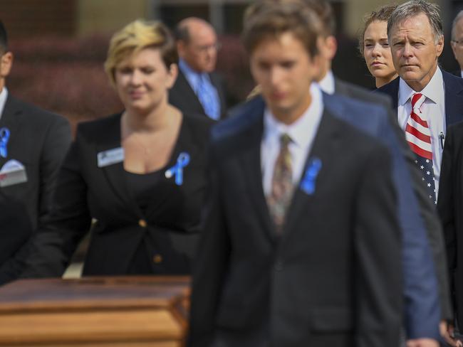 Fred Warmbier, right, follows the casket of his son, Otto, after his funeral in Wyoming, Ohio last week Picture: Bryan Woolston/AP