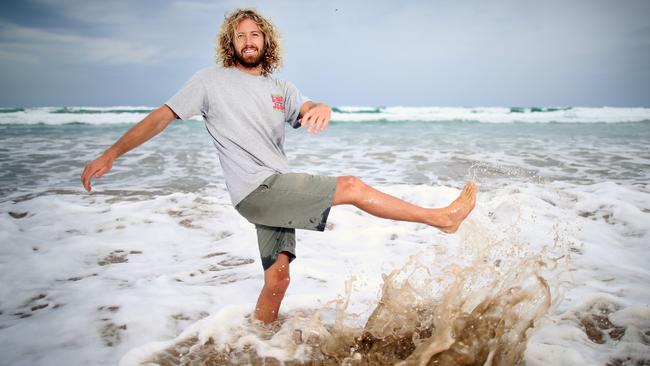 Keen surfer Ollie had a congenital knee condition but has had huge success in a Victorian-first medical trial using stem cells to regrow cartilage. Picture: Alex Coppel