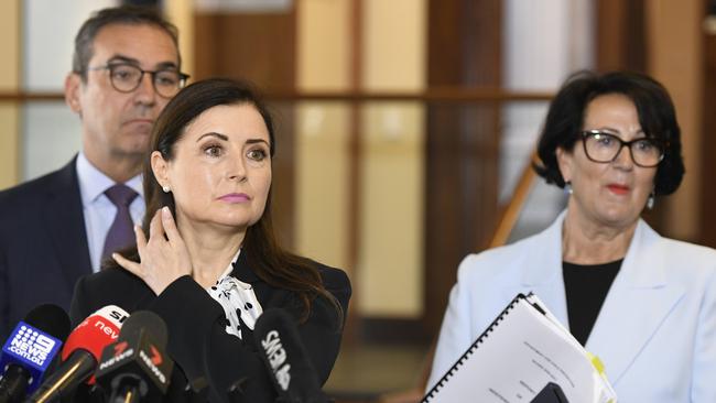 Child Protection Minister Rachel Sanderson, flanked by Premier Steven Marshall, and Attorney-General Vickie Chapman, front the media at Old Parliament House on Tuesday morning. Picture: Naomi Jellicoe