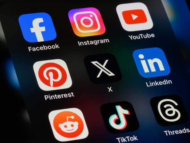 Toronto, Canada - September 24, 2023:  Popular social media apps on an Apple iPhone: Facebook, Instagram, YouTube, Pinterest, X (formerly Twitter), LinkedIn, Reddit, TikTok, and Threads.