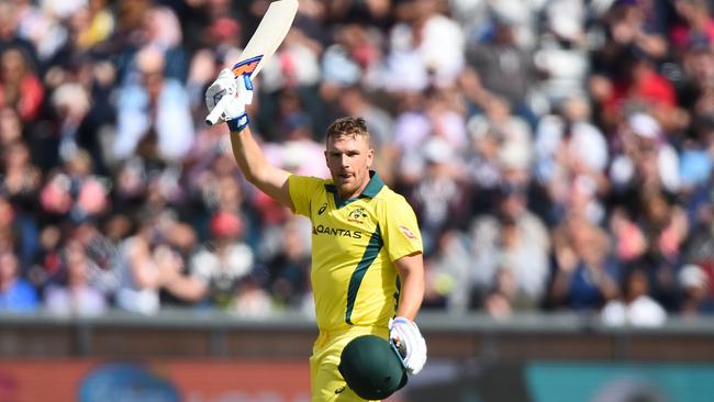 Aaron Finch celebrates an one-day international century.