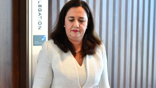 Queensland Premier Annastacia Palaszczuk is seen leaving a press conference at the 1 William Street building in Brisbane, Friday, November 3, 2017. Premier Palaszczuk held the press conference to accuse the Liberal National Party of a smear campaign by alleging she has a conflict of interest over the controversial Adani melamine. (AAP Image/Darren England)