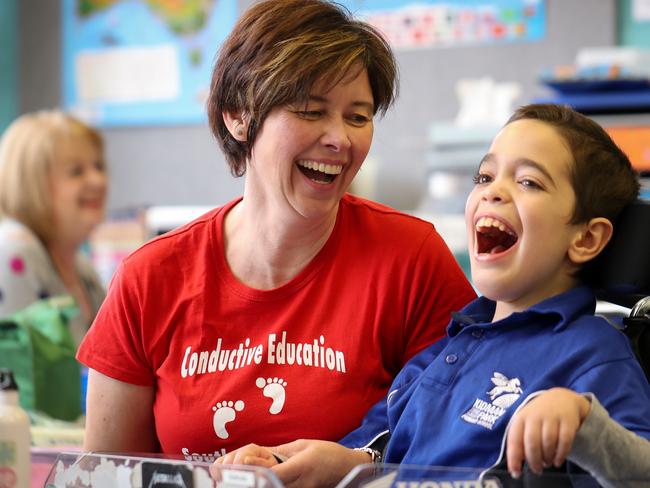 4/7/16 Australian of the Day. Kati Balla with student Duncan at the Kidman Park Primary School.Picture by Matt Turner.