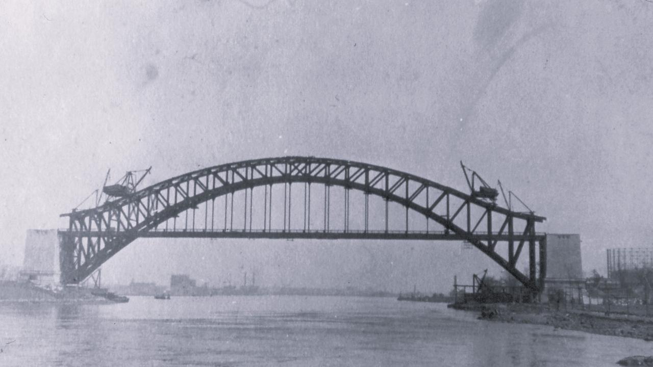 The Hell Gate Bridge, the inspiration for the Sydney Harbour Bridge, under construction. Picture: Greater Astoria Historical Society.