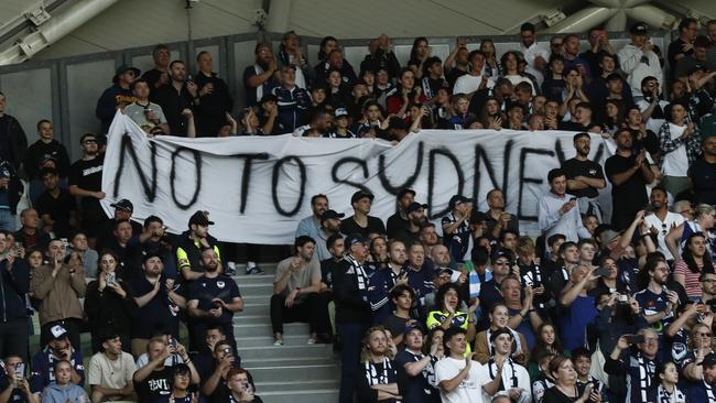 MELBOURNE, AUSTRALIA - DECEMBER 17: Fans show their disappointment with the APL before the round eight A-League Men's match between Melbourne City and Melbourne Victory at AAMI Park, on December 17, 2022, in Melbourne, Australia. (Photo by Darrian Traynor/Getty Images)