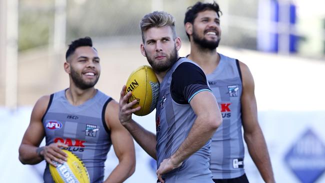 Port Adelaide’s Jackson Trengove with Jarman Impey. Picture: Sarah Reed