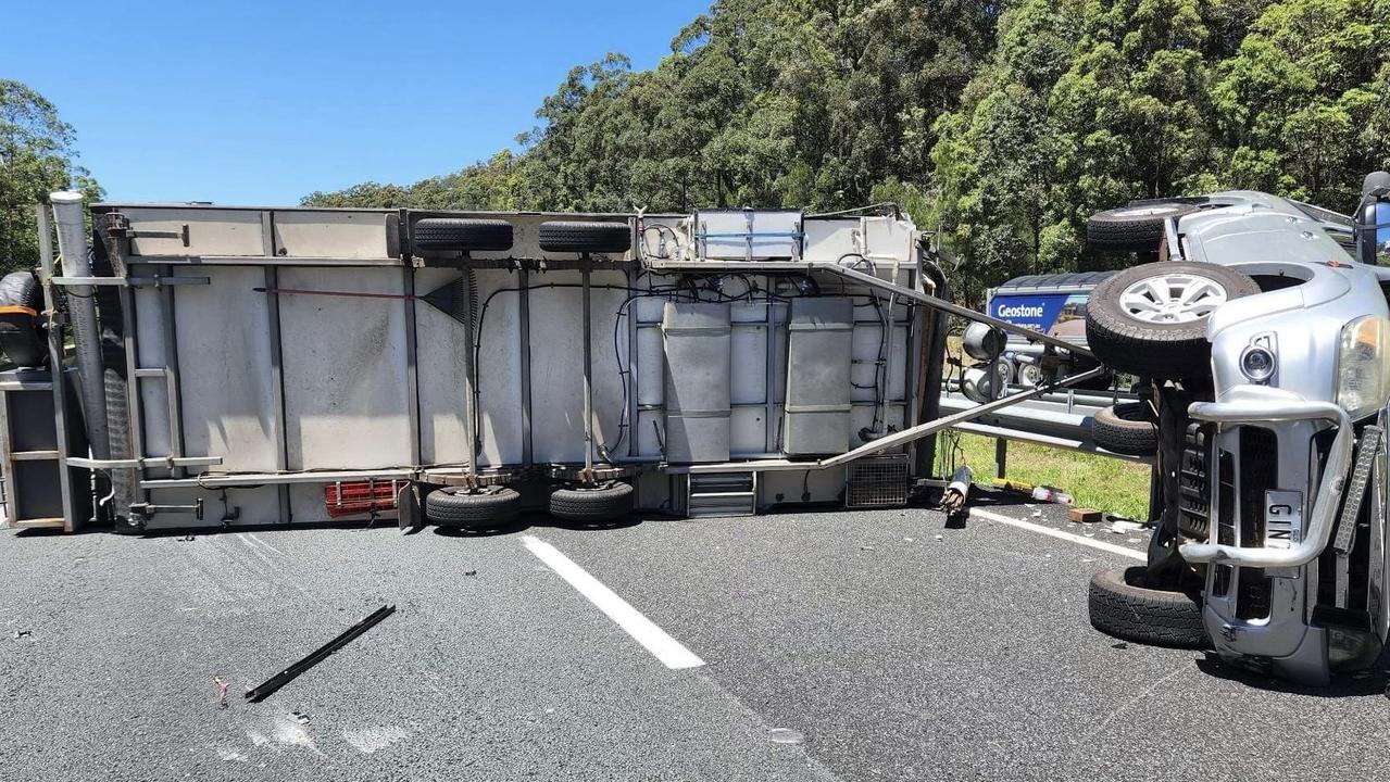 The Bruce Hwy southbound near Nambour was closed after a car towing a caravan rolled. Photo: Contributed