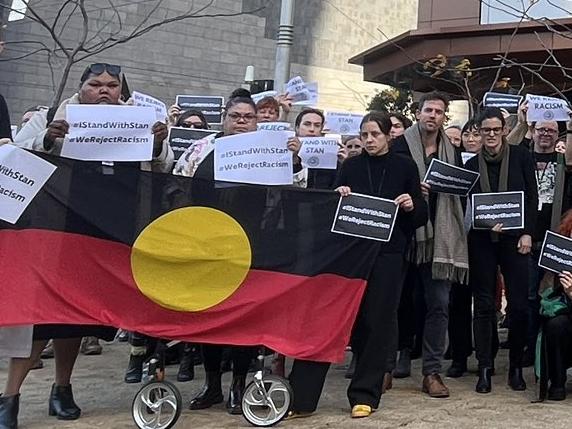 Staff at the ABC have staged a walk out today over the exit of Q+A host Stan Grant — who is leaving the broadcaster over racist abuse.