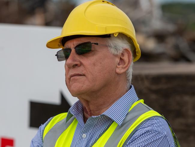 Kon Vatskalis (Mayor) at the first crushing of significant metal waste extracted from landfill as part of City of Darwin's new contract with Veolia.Picture: Che Chorley