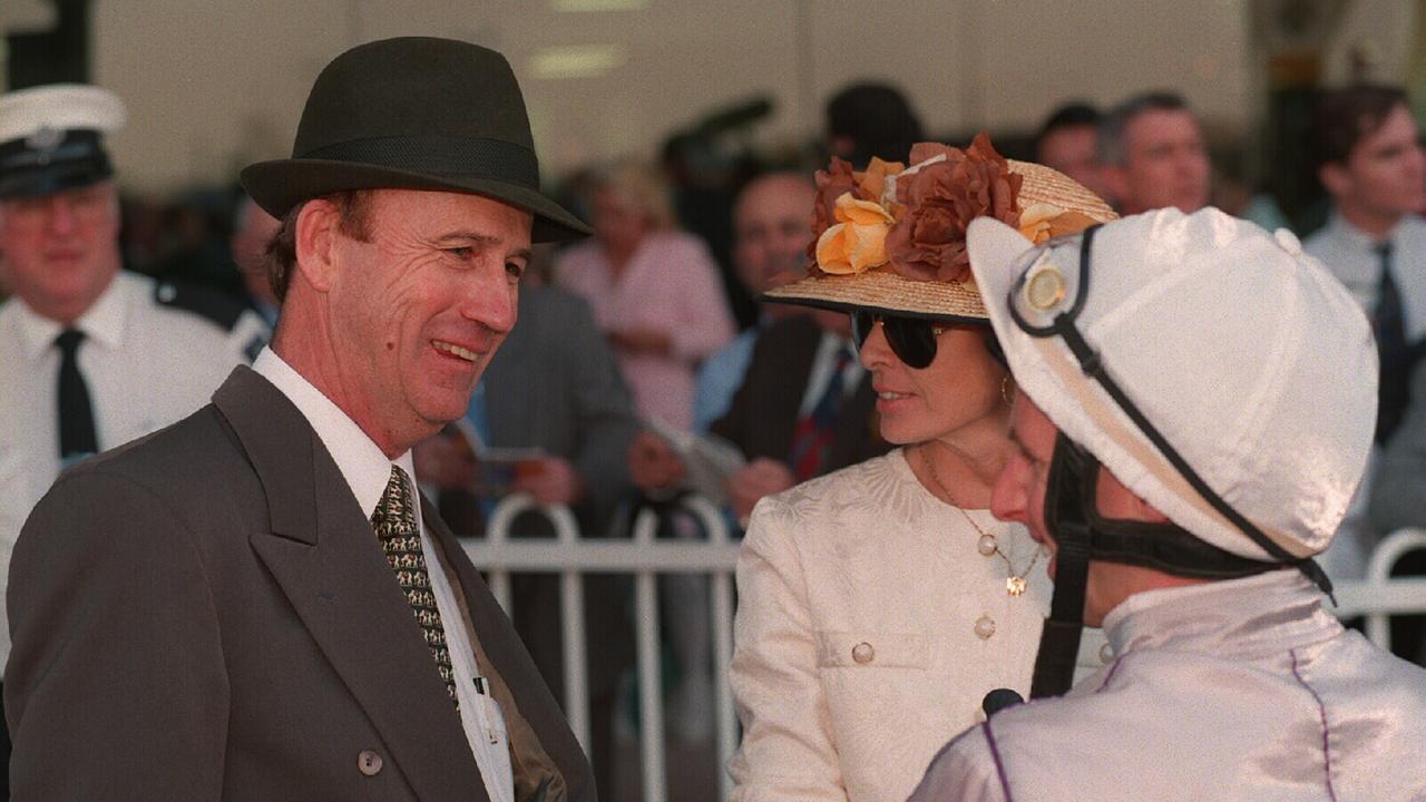 Racehorse trainer Brian Mayfield-Smith with wife Marie talking to jockey Larry Cassidy.           Sport / Turf / Head / Family / With Others