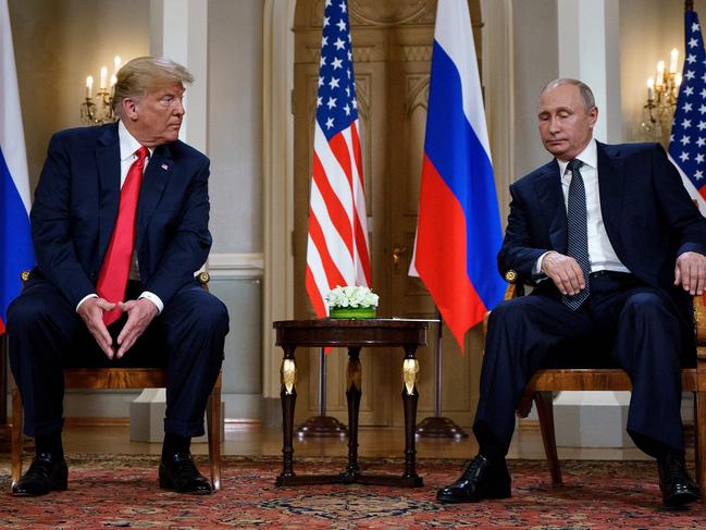 Donald Trump and Vladimir Putin during a meeting in 2018. Picture: Brendan Smialowski / AFP