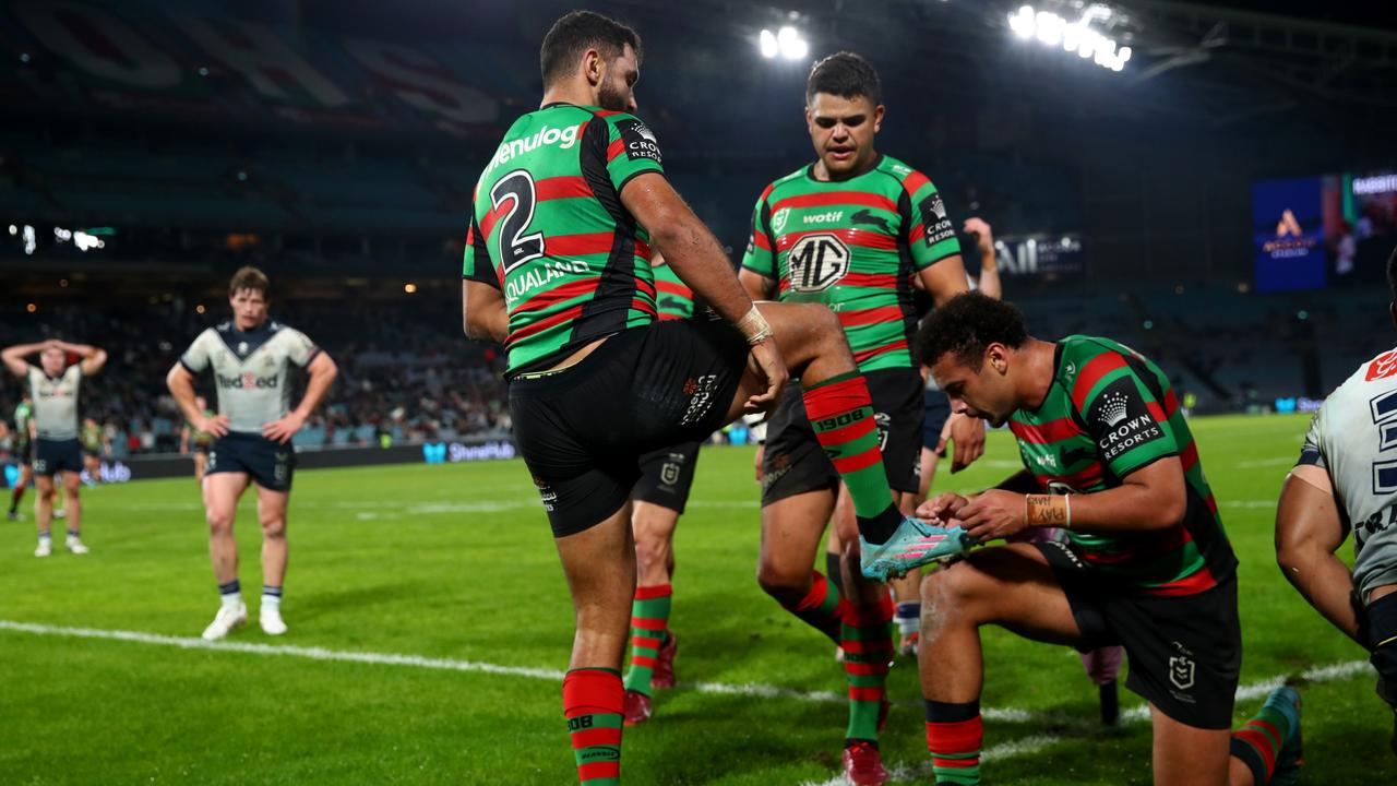 Alex Johnston celebrates with teammates after scoring against the Storm. Picture: Jason McCawley/Getty Images