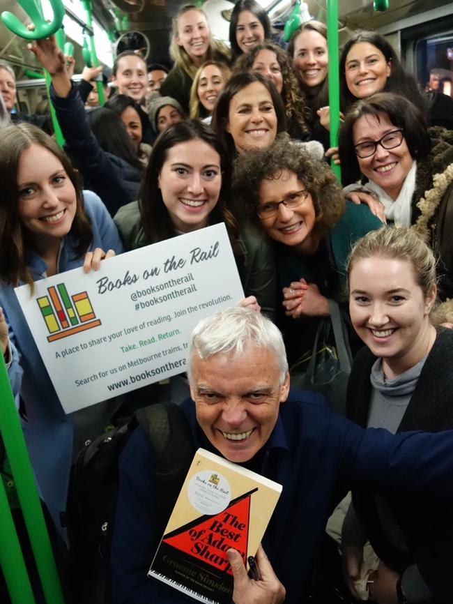 Author Graeme Simsion leads a book club and Q&amp;A on the number 3 tram. Picture: Books on the Rail