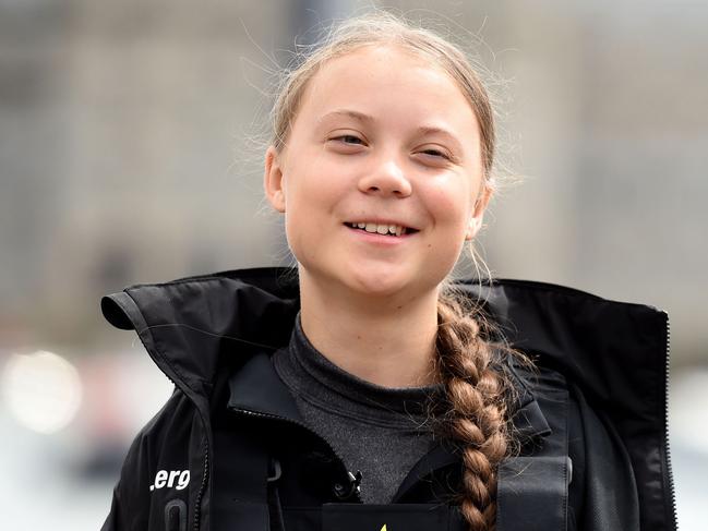 PLYMOUTH, ENGLAND - AUGUST 14: Climate change activist Greta Thunberg speaks at a press conference before setting sail for New York in the 60ft Malizia II yacht from Mayflower Marina, on August 14, 2019 in Plymouth, England. Greta Thunberg is a teenage activist born in Sweden in 2003. She began protesting outside the Belgian Parliament aged 15 and started the School Strike for Climate movement which has gained global popularity seeing school students campaigning against Climate Change on Fridays instead of attending their lessons. Greta has stopped flying as the aviation industry is responsible for 12% of CO2 emissions from all forms of  transports. Once in New York she will attend a climate change conference. (Photo by Finnbarr Webster/Getty Images) ***BESTPIX***