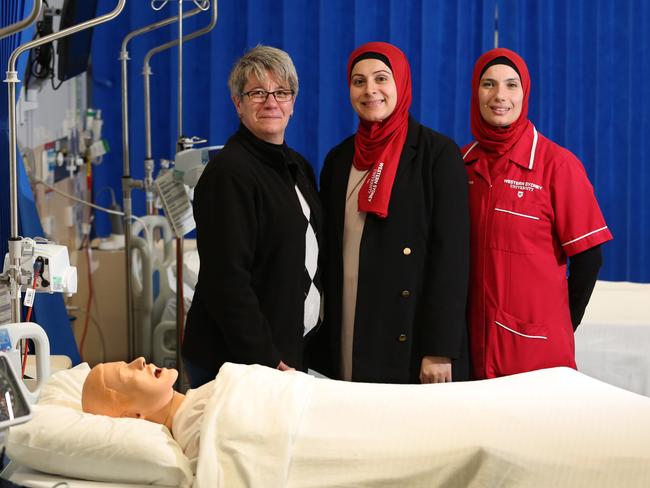 The program's co-creators, Western Sydney University director of clinical Sue Willis and lecturer and deputy director clinical education midwifery Dr Rakime Elmir, with third year nursing student Saja Chaabou are pictured at the university’s nursing lab. Picture: Robert Pozo