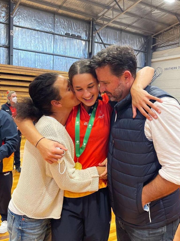 Tabitha Packer with her family after taking out the 17/U MVP of the tournament award at the 2022 NNC. Picture: Netball SA.