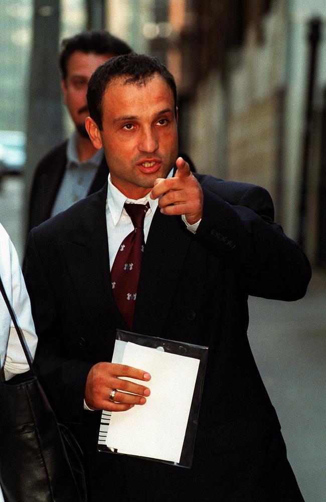 Jim Taousanis leaves NSW Supreme Court in 1999 after being freed on bail when a jury failed to decide if he was responsible for 1991 murder of missing man Peter Mitris. Picture: News Corp