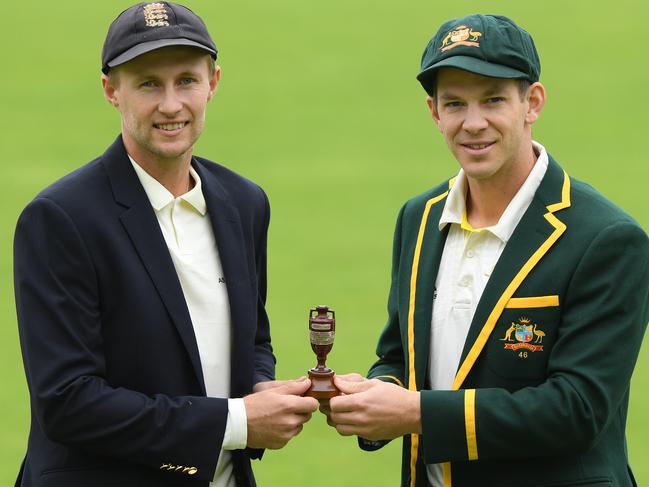 FILE - 2019 Ashes Series Best of - BIRMINGHAM, ENGLAND - JULY 31: England captain Joe Root (l) and Australia captain Tim Paine pictured holding the urn ahead of the First Ashes Test Match against Australia at Edgbaston on July 31, 2019 in Birmingham, England. (Photo by Stu Forster/Getty Images)