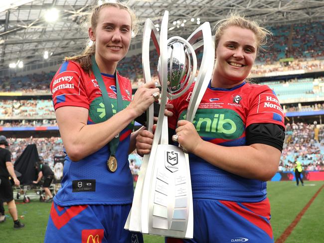 Newcastle Knights’ duo Tamika Upton and Hannah Southwell with the NRLW premiership trophy. (Photo by Matt King/Getty Images)