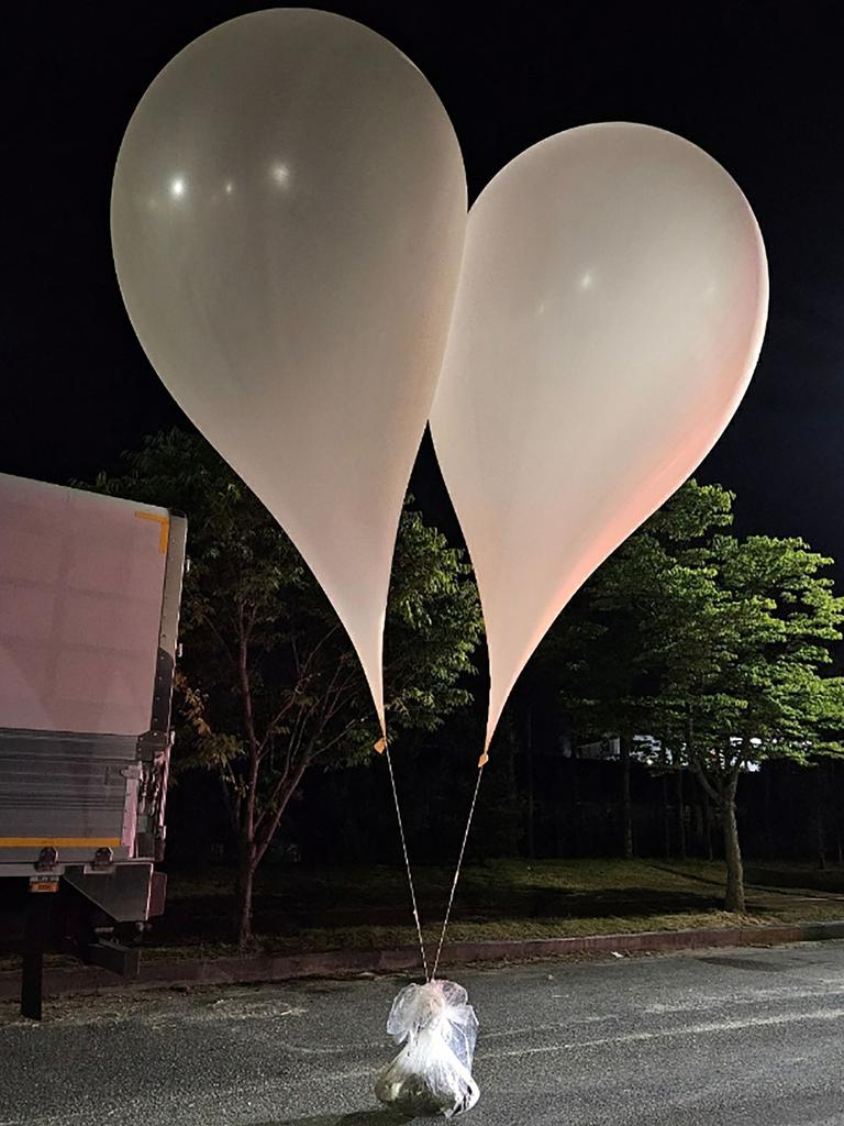 The South Korean Defence Ministry released this handout image on May 29 showing a large parcel thought to contain faeces attached to balloons sent over the border by North Korea. Picture: South Korean Defence Ministry/AFP