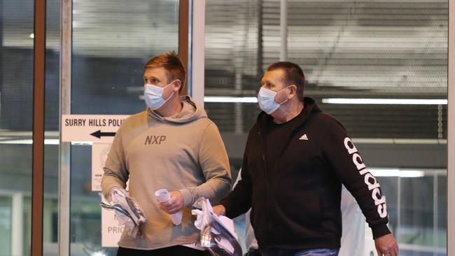 Darren Greenfield and Michael Greenfield leave the Surry Hills police station on bail after being arrested on corruption charges in 2021. John Feder/The Australian.