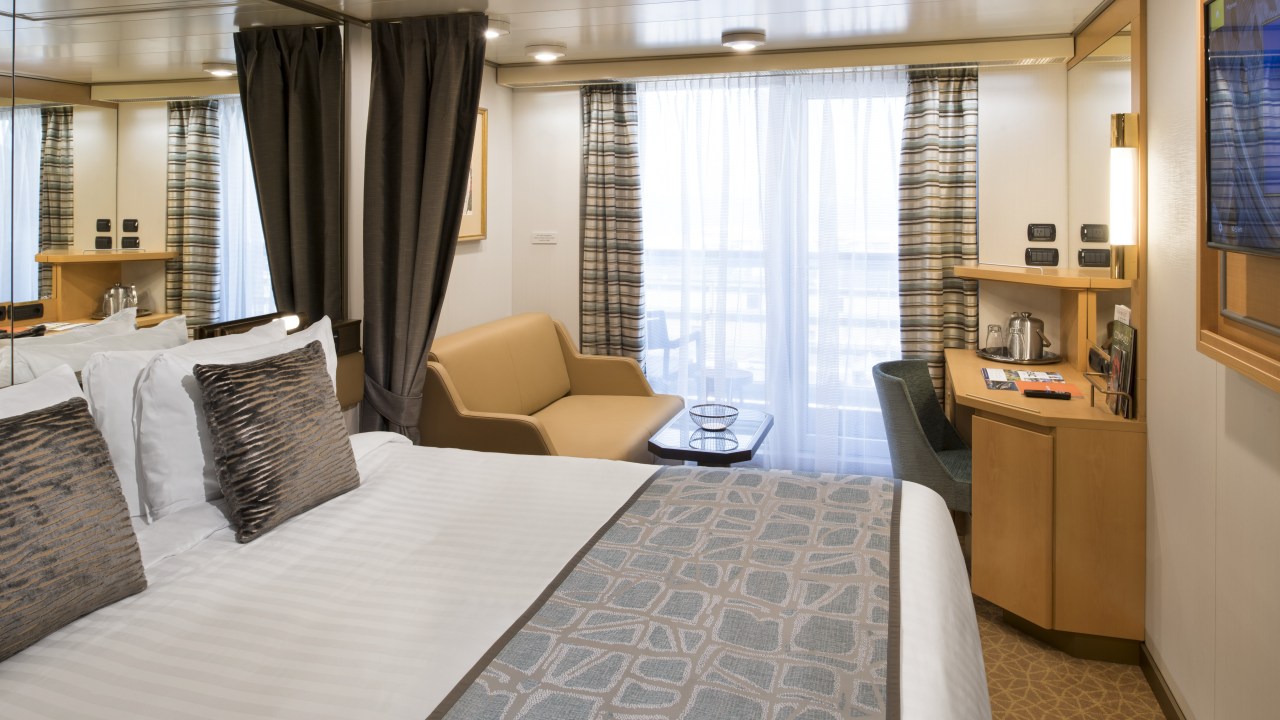 <h2><span>The room</span></h2><p><span>My friend and I are sharing a Verandah Stateroom on deck 5, which is appointed with a small seating area, queen-sized bed, TV, ensuite with shower and tub, and a verandah with floor-to-ceiling windows from which we watch Mt Stromboli spew lava at dusk one night (absolute bucket list stuff). There&rsquo;s a good amount of hanging space in the wardrobe and a nook to store my suitcase. The space functions exceptionally well for two people. A menu placed in the room on arrival gives you the option of changing the configuration of the beds into twin, if you prefer. Pro tip: 24-hour room service is included.&nbsp;&nbsp;</span></p>