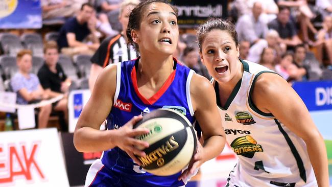 06/12/15 - Adelaide Lightning v Dandenong Rangers WNBL game at ADELAIDE ARENA. Adelaide's Leilani Mitchell takes the ball to the basket in front of Dandenong's Annalise Pickrel. Photo Tom Huntley