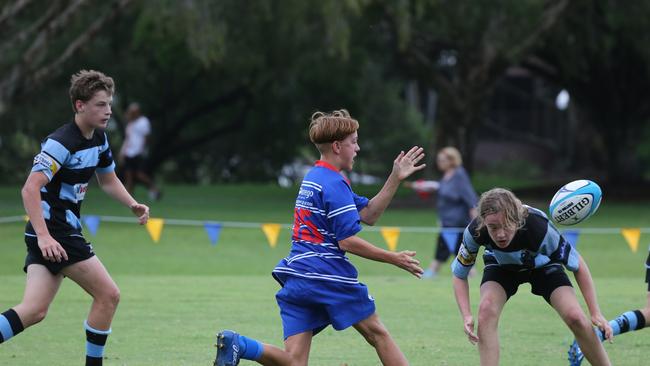 Day 1 of the King of the Country junior rugby union tournament at the Gold Coast Eagles Rugby Union Club.Maroochydore Swans (BLUE AND BLACK) vs USQ Saints (Blue ) Maroochydore Player No USQ Player No Pic Mike Batterham
