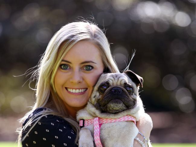 NSW Government MPs come together for Dogs in Politics Day, a joint venture to raise awareness for all dogs still looking for a home and to encourage people looking to adopt not shop and save a life. Animal Justice Party MP Emma Hurst pictured with Mia the pug in the Domain. Picture: Toby Zerna