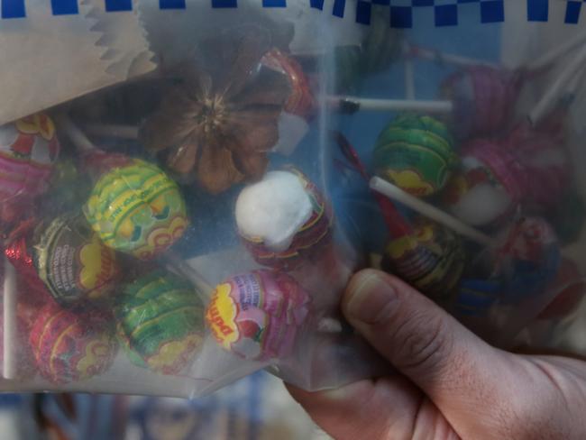 Detectives have today arrested three men over their alleged involvement in the importation of methylamphetamine and cocaine concealed in lollipops and lollies from the United States., , In early November 2020, Australian Border Force (ABF) officers at the Sydney Gateway Facility mail centre intercepted three packages that arrived in Sydney from the United States containing methylamphetamine and cocaine., , Officers from Northern Beaches Police Area Command were notified and established Strike Force Arced to investigate the importations, with assistance from The Department of Home Affairs and US Homeland Security. Picture: NSW Police