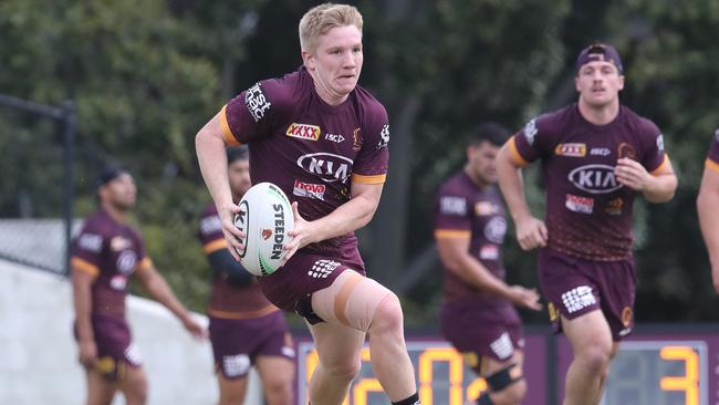 Tom Dearden runs with the ball during a Brisbane Broncos training session last month.