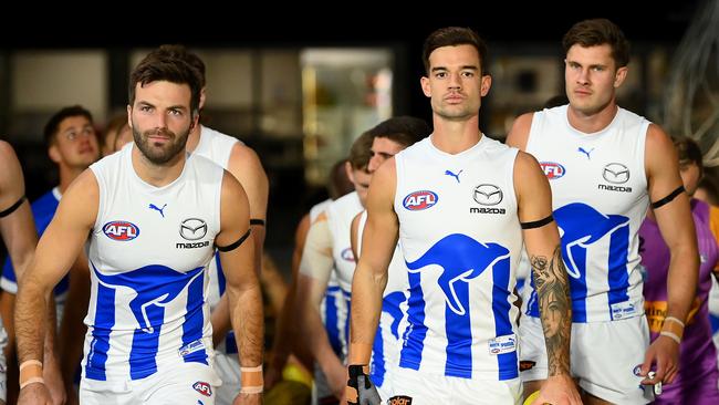 Jy Simpkin (middle) took over the captaincy at North Melbourne this year alongside Luke McDonald (left). (Photo by Quinn Rooney/Getty Images)