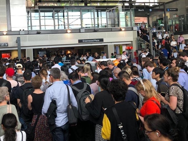 Commuters packed in like sardines at Greenwood Station.