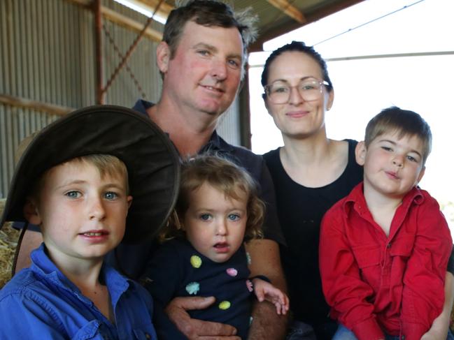 WEEKEND NEWSPAPERS SPECIAL. PLEASE CONTACT WEEKEND PIC EDITOR JEFF DARMANIN BEFORE PUBLISHING.   Farming family from outside of Dubbo. Safe on the farm but corncerned about going into town.  Brad and Katie Cox with Edward - 7yo (hat), James - 4yo, and Georgia - 2yo. Picture Dean Marzolla.