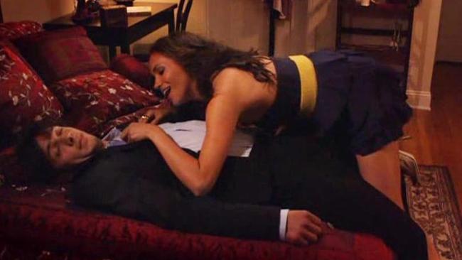 Prince Harry’s future wife can be seen getting up-close-and-personal with one of her co-stars.