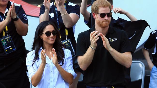 Prince Harry with Meghan Markle at a wheelchair tennis match during the Invictus Games in Toronoto. Pictures: Vaughn Ridley/Getty Images for the Invictus Games Foundation