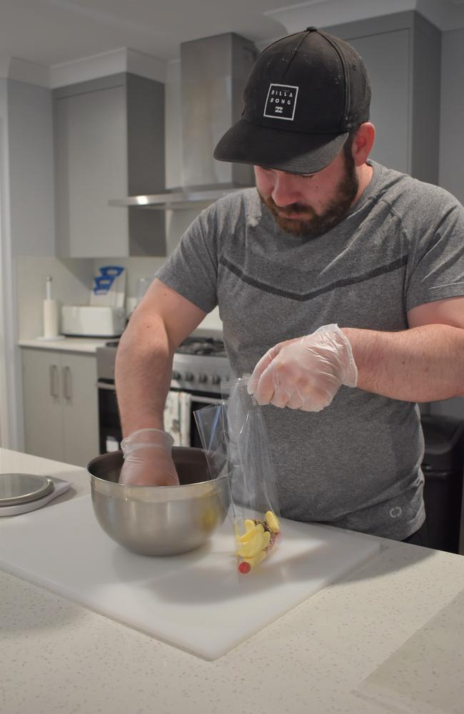 Steve preparing the lollies for one of the boxes.