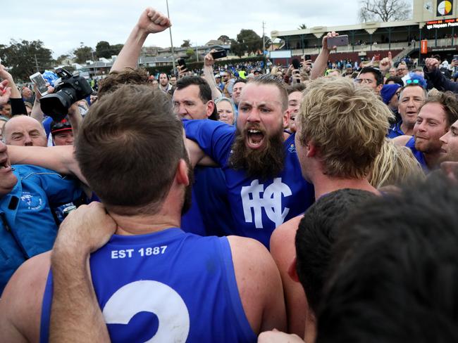 Hastings players celebrate with the premiership cup during the Nepean FL Grand Final between the Frankston Bombers and Hastings played in Frankston on Saturday 10th September, 2016. Picture: Mark Dadswell