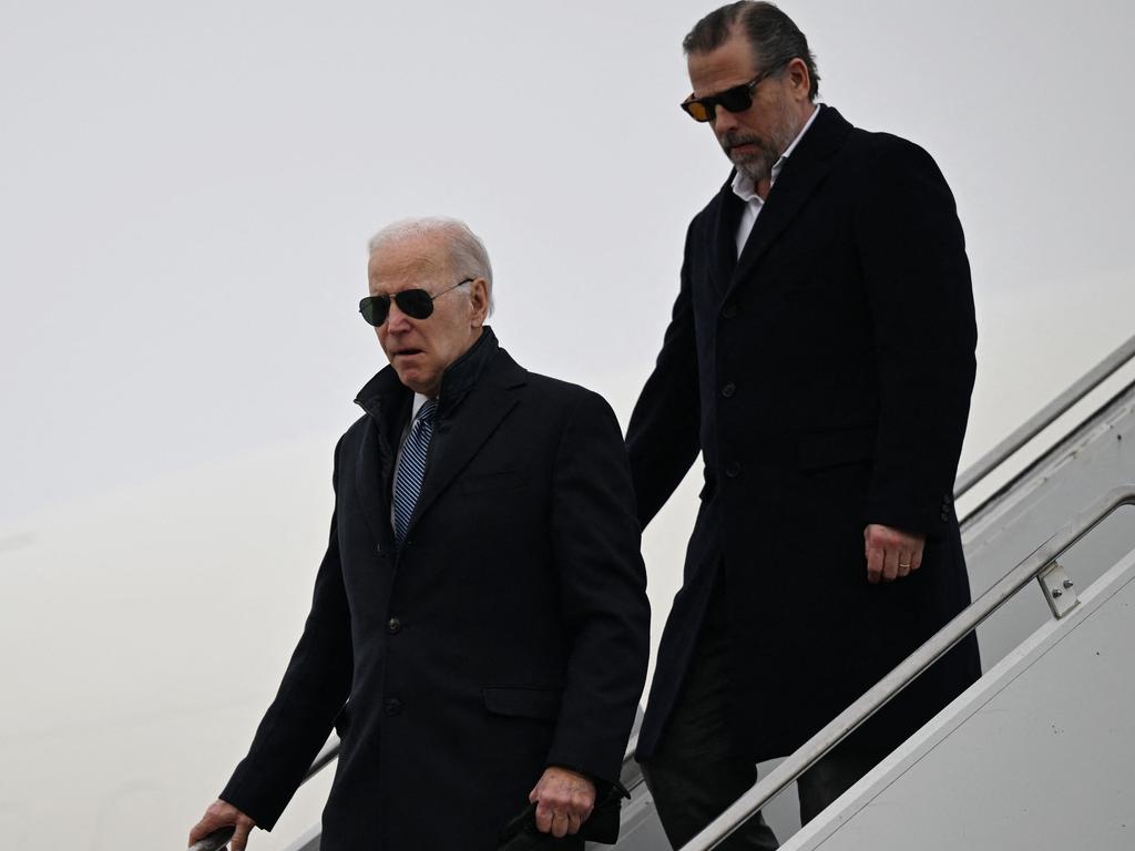 (FILES) US President Joe Biden, with son Hunter Biden, arrives at Hancock Field Air National Guard Base in Syracuse, New York, on February 4, 2023. The US Justice Department on Friday escalated its investigation into President Joe Biden's son Hunter, naming a special counsel amid allegations he engaged in illicit business deals overseas. Attorney General Merrick Garland appointed Delaware federal prosecutor David Weiss, who recently investigated Hunter Biden on tax and gun charges in a case that remains open. Weiss, who opened his probe in 2019, recently revealed that he was investigating Biden along other lines, and Garland said Weiss had requested special counsel status to be able to pursue his probe more widely. (Photo by ANDREW CABALLERO-REYNOLDS / AFP)