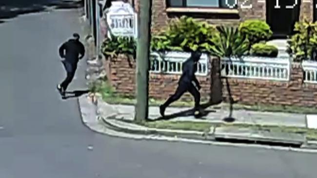 Manhunt... CCTV of men believed to be behind Hawi’s shooting. Picture: NSW Police