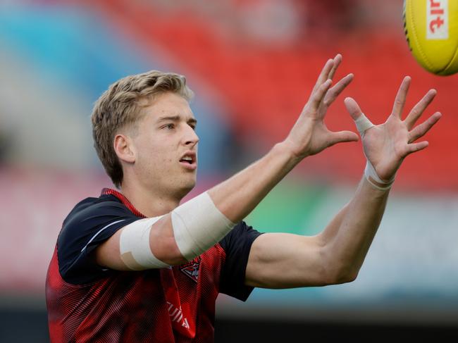 GOLD COAST, AUSTRALIA - JUNE 02: Nick Bryan of the Bombers warms up prior to the 2024 AFL Round 12 match between the Gold Coast SUNS and the Essendon Bombers at People First Stadium on June 02, 2024 in Gold Coast, Australia. (Photo by Russell Freeman/AFL Photos via Getty Images)