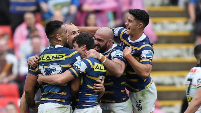 Dylan Brown and Parramatta teammates celebrates Reed Mahoney’s try against Penrith. Picture: Brett Costello