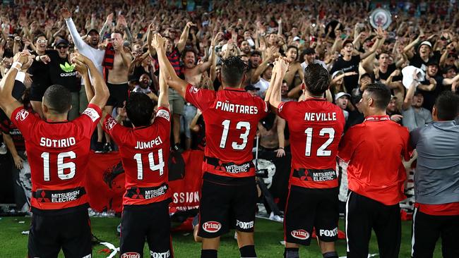 Western Sydney Wanderers players celebrate with fans after beating Sydney FC at ANZ Stadium in 2017. Picture: Getty Images