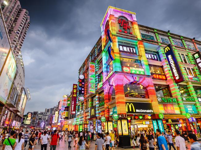 Pedestrians pass through Shangxiajiu Pedestrian Street. The street is the main shopping district of the city and a major tourist attraction. Picture: iStockDoc Holiday, Escape