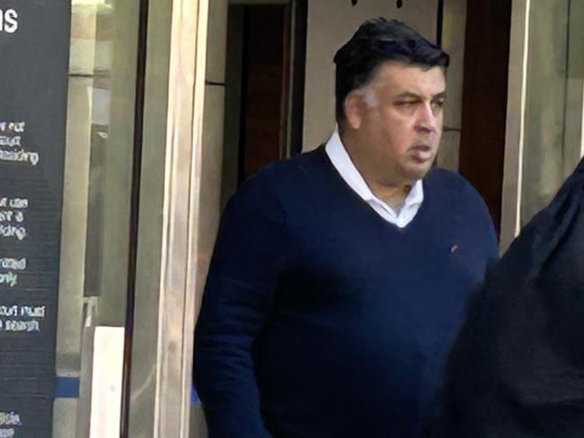 Disgraced real estate agent and auctioneer Nikolaos Haidaris leaves County Court after pleading guilty to fleecing a potential investor of more than $1m.